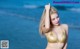 Atittaya Chaiyasing beauty poses hot on the beach with a yellow bikini (41 photos) P22 No.efb5ed