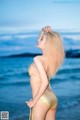 Atittaya Chaiyasing beauty poses hot on the beach with a yellow bikini (41 photos) P7 No.149f0e
