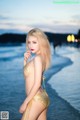 Atittaya Chaiyasing beauty poses hot on the beach with a yellow bikini (41 photos) P9 No.61b1e9